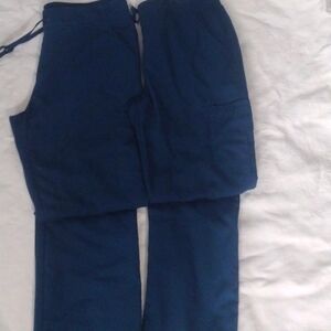 2 Scub pants. Caribbean blue,Gently won. No damages or stains